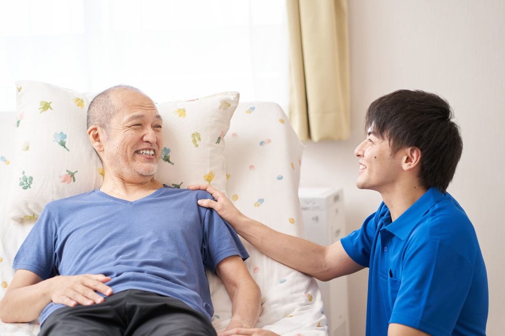 Smiley caregiver and the elderly